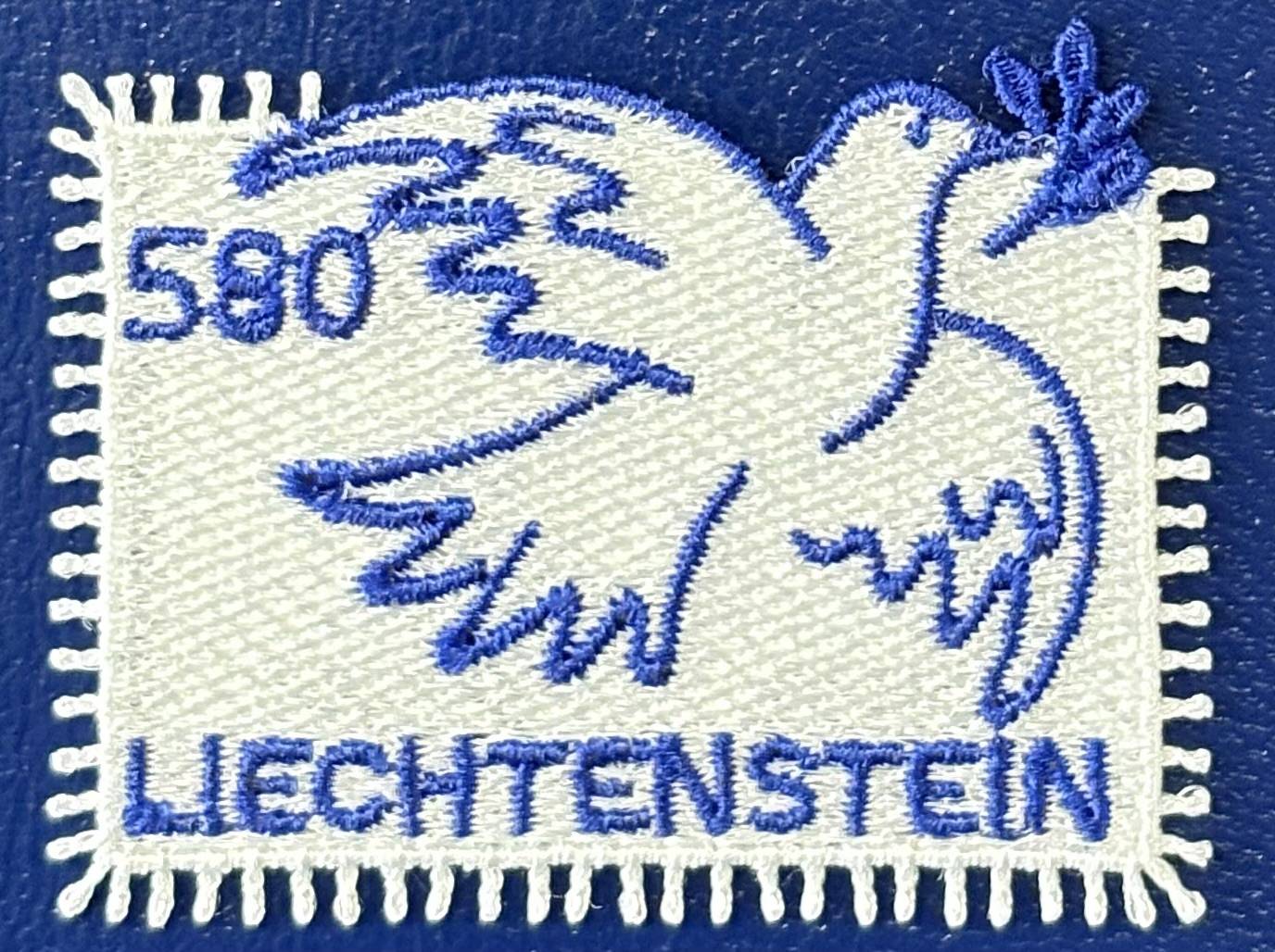 Die gestickte Friedenstaube