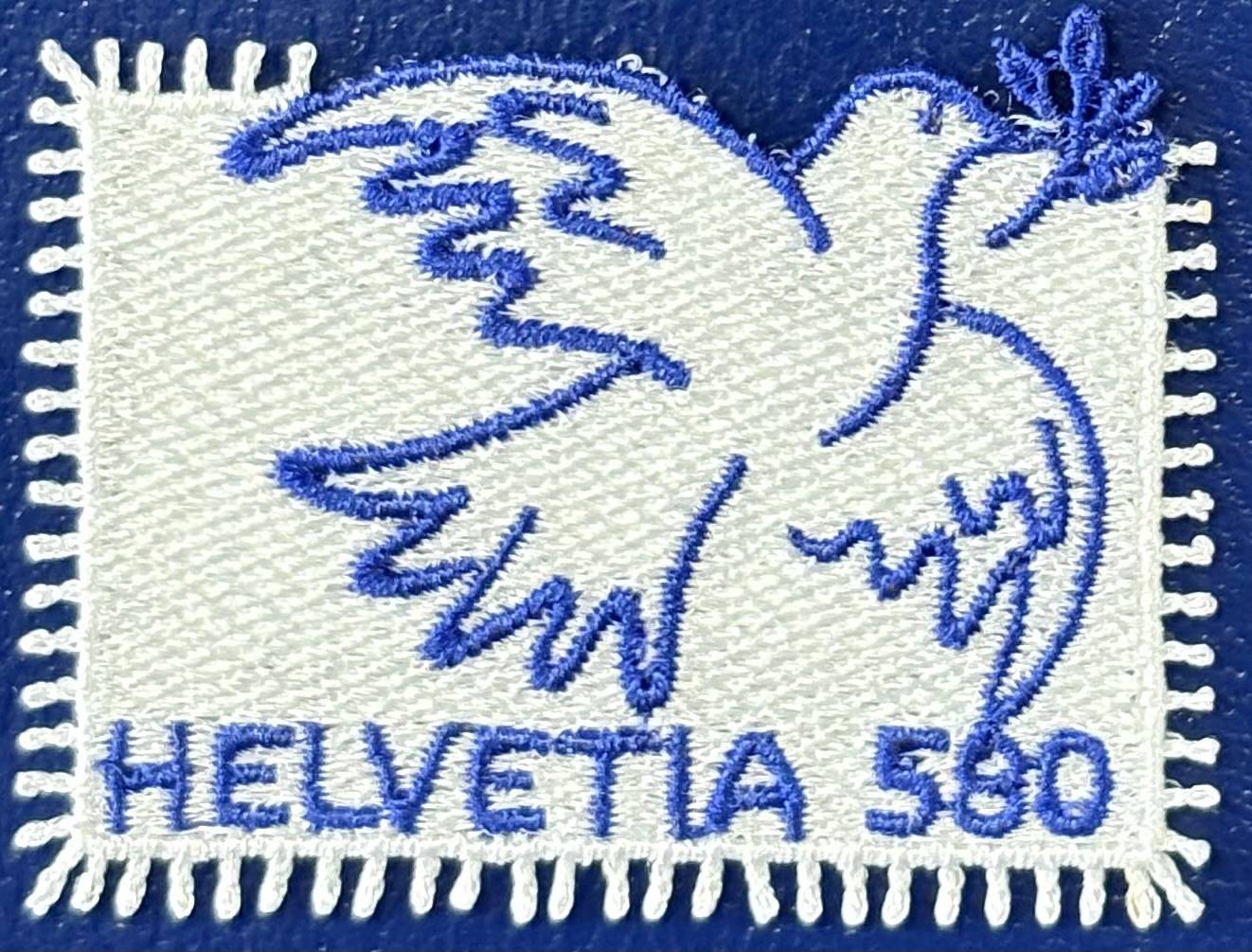 Die gestickte Friedenstaube